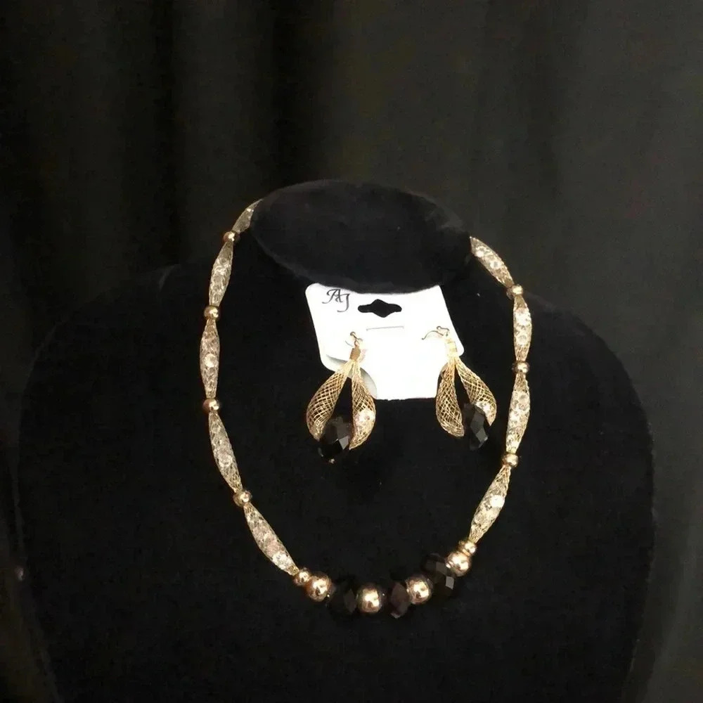 Gold‎ Necklaces with caged diamonds